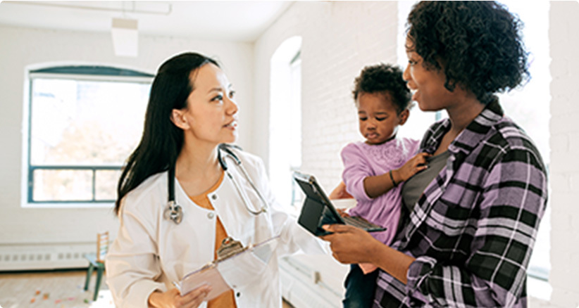 Mother talking to doctor