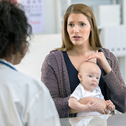 Concerned mother talking to doctor